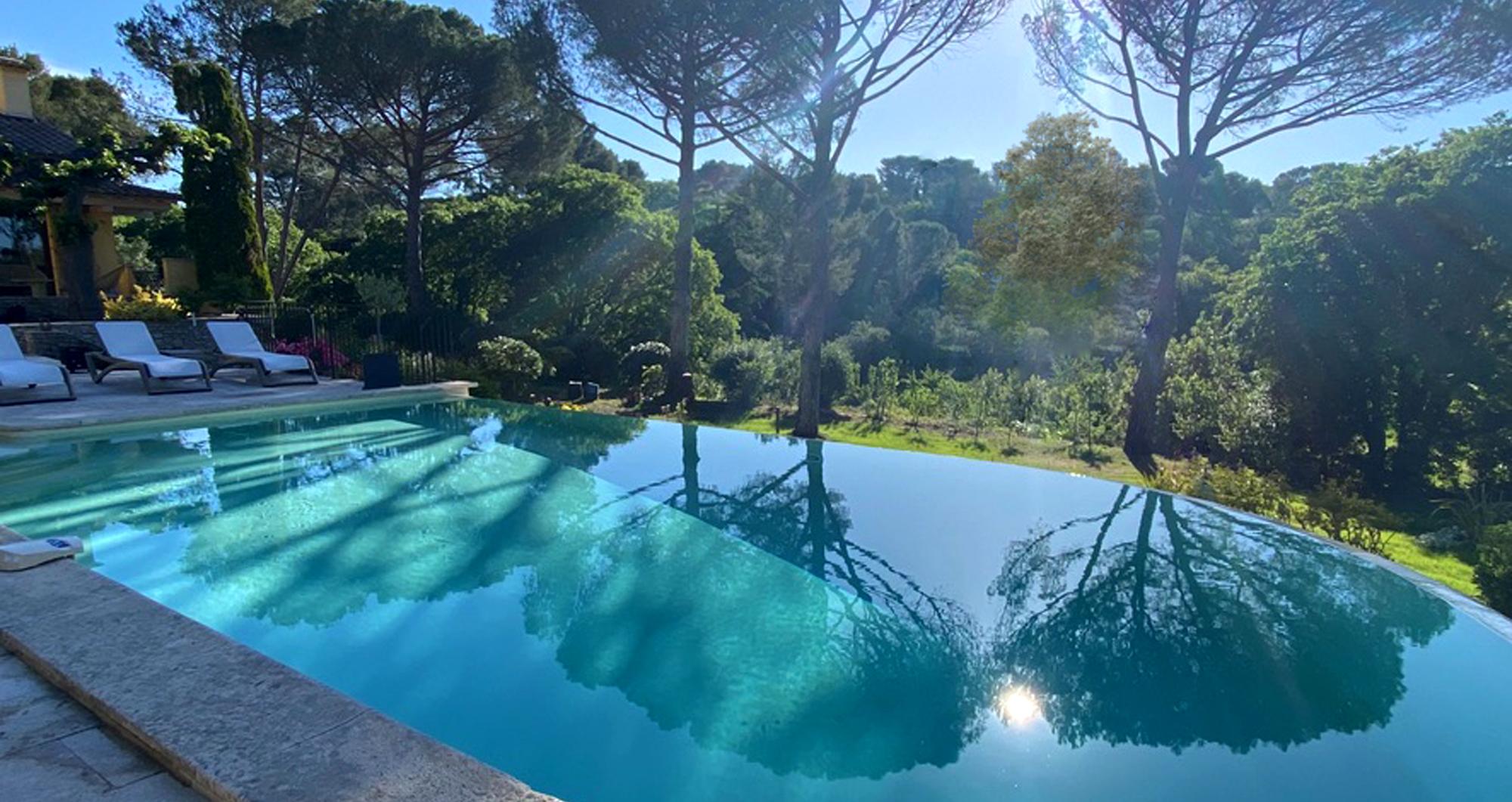 Pool, terraces, and mature trees
