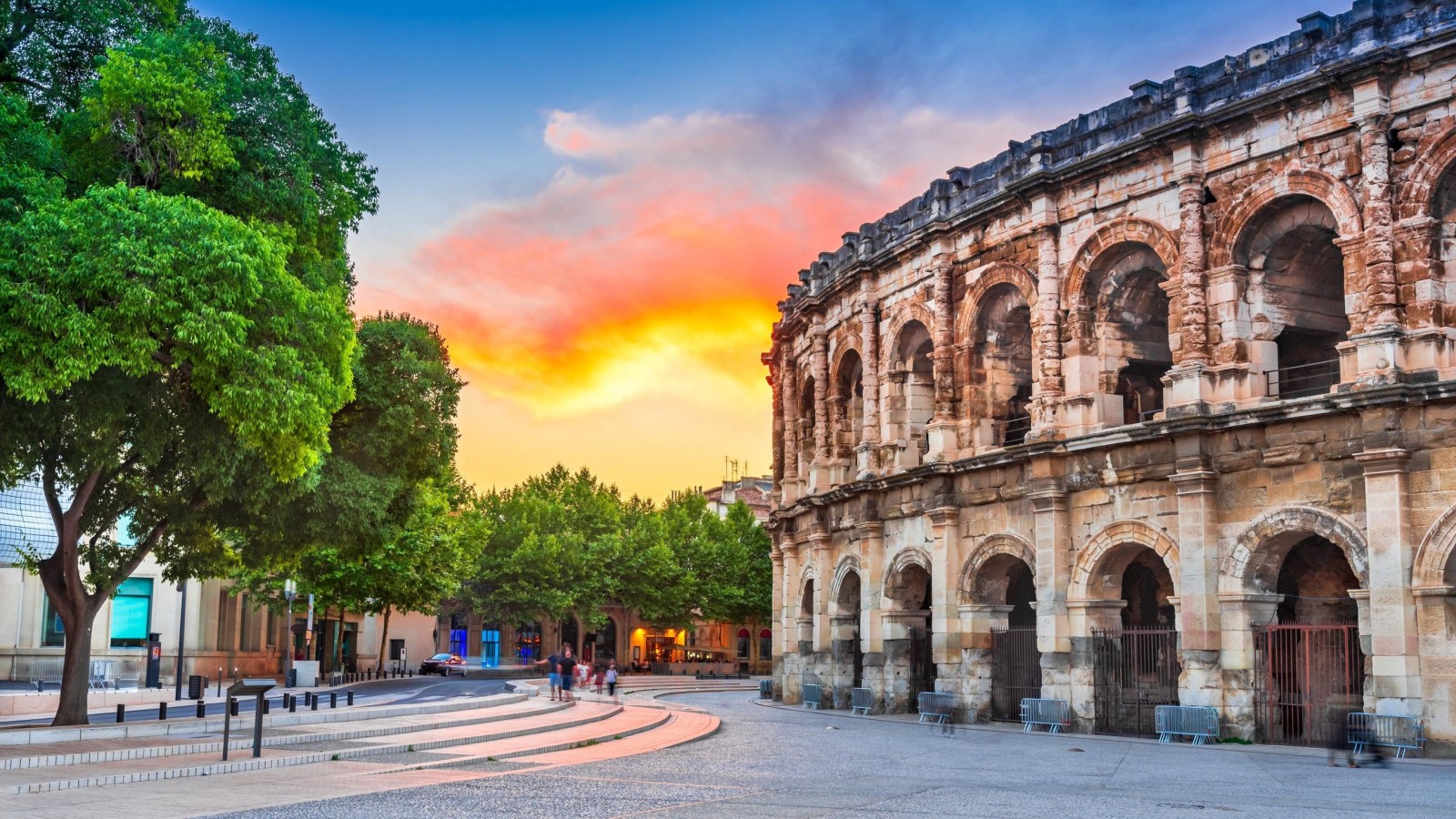 The Roman amphitheatre in Nimes at sunset
